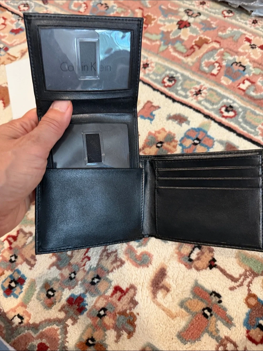 Calvin Klein Black Leather Men's Bi-Fold Wallet with Metal Logo